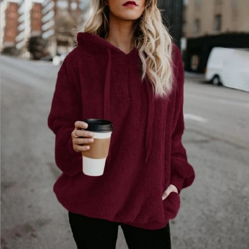 Tendance de la mode à manches longues à capuche couleur unie, manteau pull pour femme
